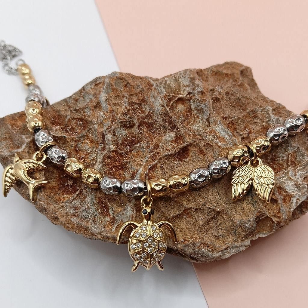 Δίχρωμο βραχιόλι με χελώνα & φτερά σε χρυσό-ασημί - Image 2