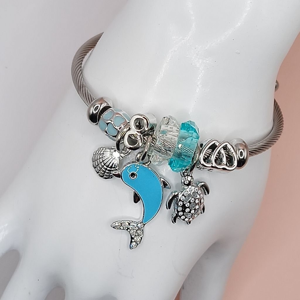 Ατσάλινο βραχιόλι με charms δελφίνι & χελώνα σε τιρκουάζ