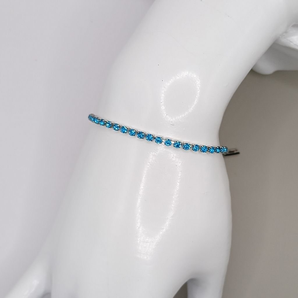 Βραχιόλι Tennis από Ασήμι 925 Επιροδιωμένο με Γαλάζια Ζιργκόν